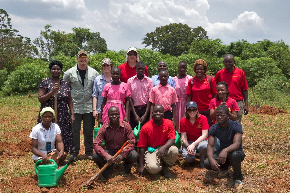 Group photo of ISU students and locals in Uganda.