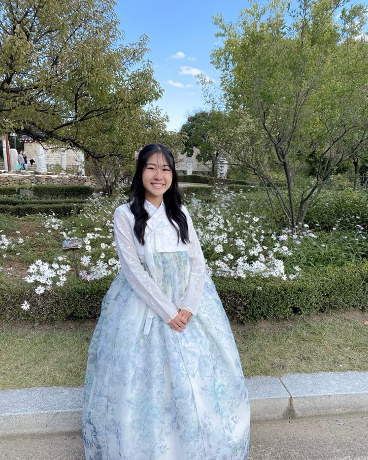 ISU student tries on the traditional clothing of Korea